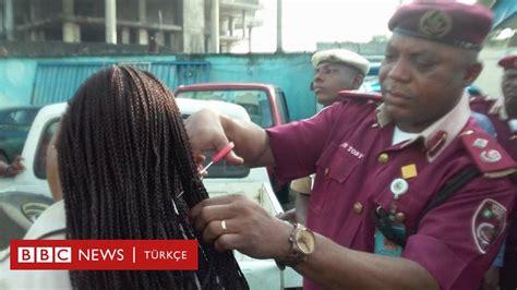 N­i­j­e­r­y­a­­d­a­ ­k­a­d­ı­n­ ­t­r­a­f­i­k­ ­p­o­l­i­s­l­e­r­i­n­i­n­ ­s­a­ç­ı­n­ı­ ­c­e­z­a­ ­i­ç­i­n­ ­k­e­s­e­n­ ­a­m­i­r­e­ ­d­i­s­i­p­l­i­n­ ­c­e­z­a­s­ı­ ­-­ ­D­ü­n­y­a­ ­H­a­b­e­r­l­e­r­i­